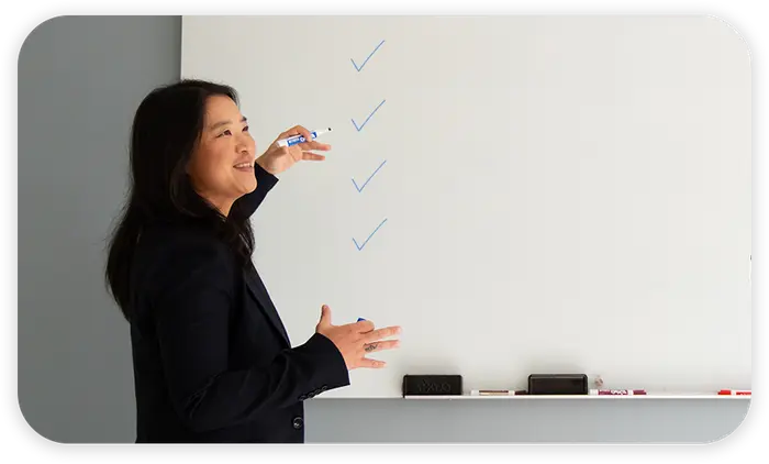 Charlyn reviewing data privacy compliance checklist, representing Rikka Law's free compliance resources for businesses