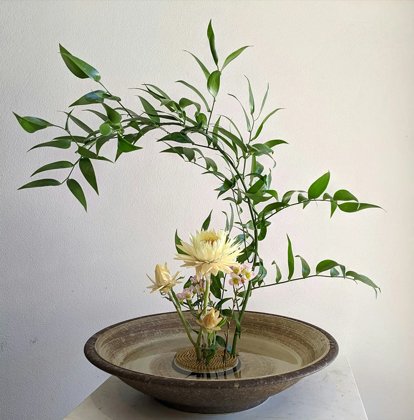 Japanese ikebana flower arrangement symbolizing the Rikka ethos